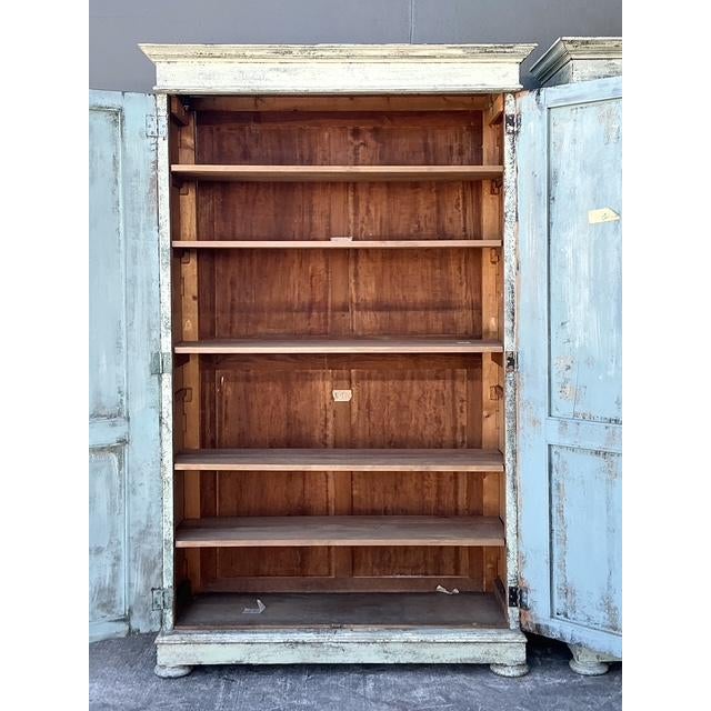 These grand-scale Belgian armoires are a breathtaking testament to 19th-century European craftsmanship. Standing over...