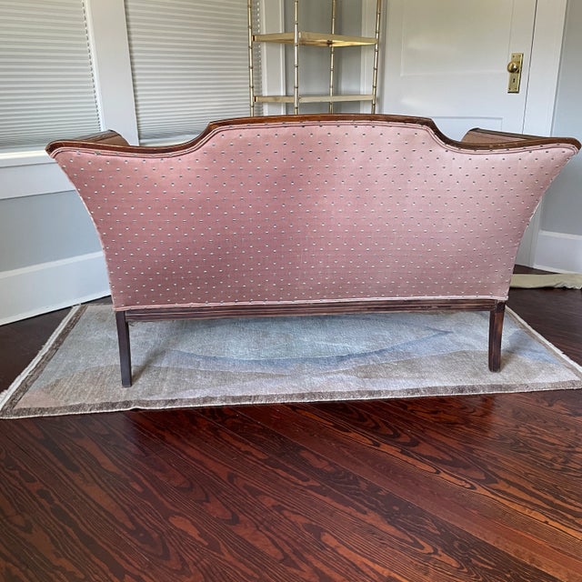 Nicely carved neoclassical wood trim loveseat. Likely mahogany. Excellent proportions. Feather/down cushion.