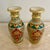 Pair of hand-painted Meenakari vases crafted from white marble with red gold and green detailing and small glass stone...