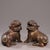 This is a matched pair of antique gilt bronze sculptures depicting Pixiu, mythical creatures revered in traditional Asian...