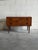 Beautiful vintage Danish Modern small dresser crafted in teak, featuring clean Scandinavian lines, sculptural recessed...
