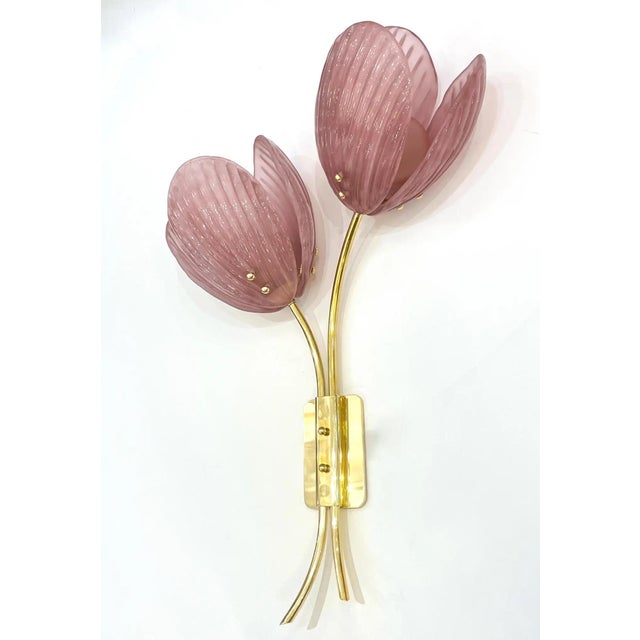 A celebration of floral grace and Italian craftsmanship, this exquisite pair of wall lights transforms lighting into a...