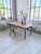 Antique 19th-century farmhouse table in solid cherry wood. ultra-elegant and timeless with its delicately turned legs, it...