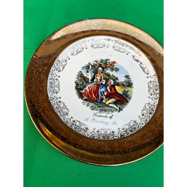 Up for consideration is a beautiful vintage ceramic St. Petersburg colonial style plate with a gold rim. This would look...