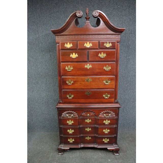 Chippendale style Chest on Chest By Thomasville. Made of Mahogany , made in 2 pieces , the top features a broken arch...