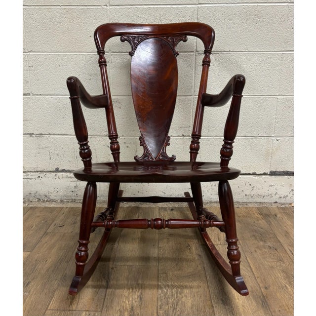 This is a beautiful vintage Art Nouveau style rocking chair with gorgeous and ornate carvings. Wood appears to be oak or...