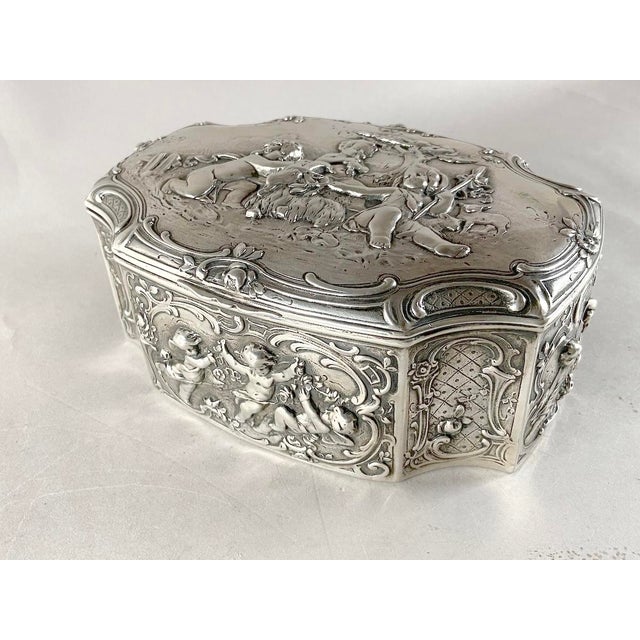 A remarkable late 19th-century European Rococo Revival trinket box, most likely produced by a Hanau silver workshop and...