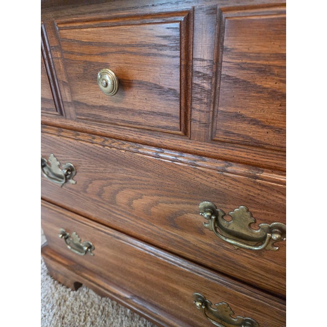 Mid-Century Pennsylvania House Oak Bedside Chest of Drawers Nightstand featuring three drawers with dovetailed...