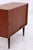 Vintage teak chest of drawers with clean lines and practical sliding doors. The slender, tapered legs and beautiful grain...