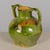 A 19th century French Provincial green glazed terracotta water jug, know as an orjol or cruche. Beautiful variegated color...