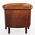 This leather club chair speaks luxury! With its rounded back and rolled arms with decorative nails, this chair has...