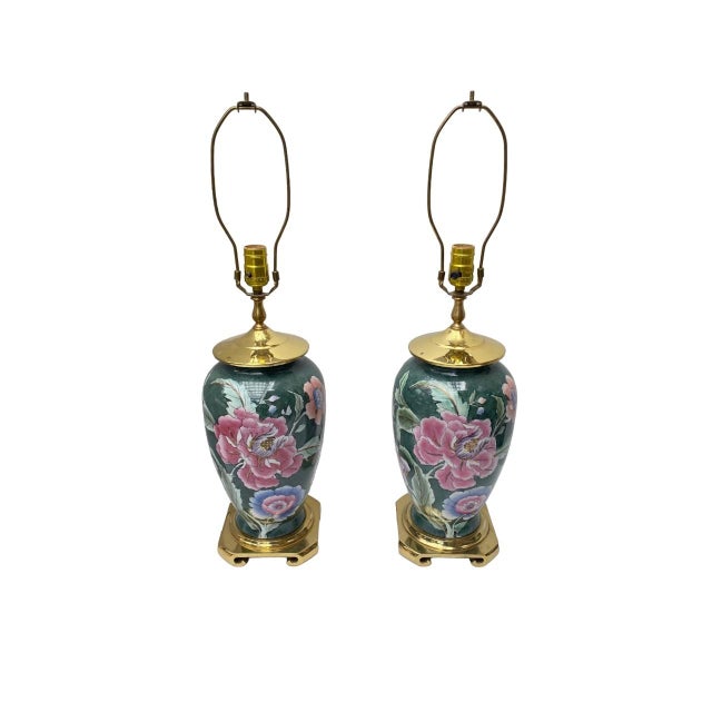 A beautiful pair of vintage ceramic table lamps featuring hand-painted oversized peony blossoms in soft shades of pink,...