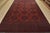 A tribal Turkmen rug hand-knotted with fine wool and natural dyes. This nomadic rug features rows of geometric medallions...