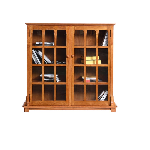 "The Mission Solid Oak Double Door Bookcase - Michael's Cherry is a beautifully designed piece, combining functionality...