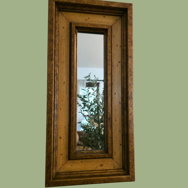 This vintage rustic wood wall mirror was crafted in the late 1970s to early 1980s by Triangle Industries of Los Angeles,...