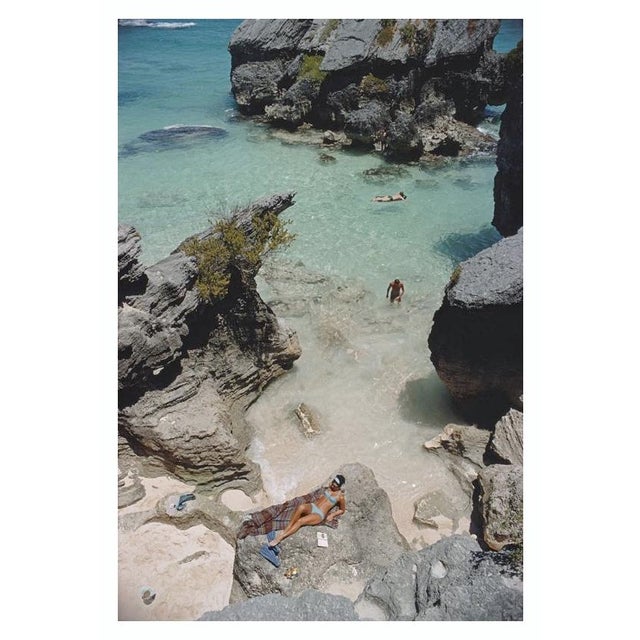 On The Beach In Bermuda 1967 Sunbathing and swimming at a beach in Bermuda, June 1967. Slim Aarons Slim Aarons was one of...