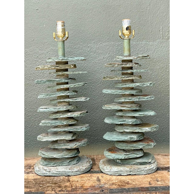 This striking pair of vintage stacked slate table lamps beautifully combines natural stone with warm brass accents,...
