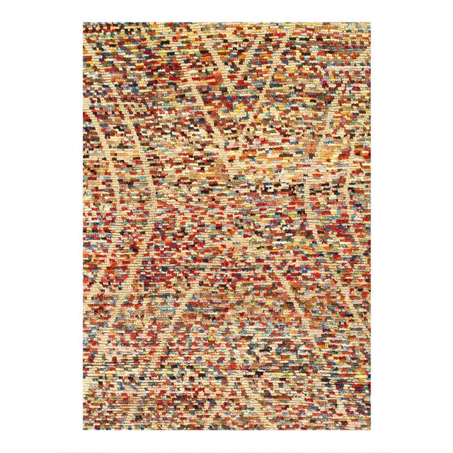 This Moroccan Collection hand-knotted rug is a testament to the enduring craftsmanship of wool textiles. The 6x9 piece...