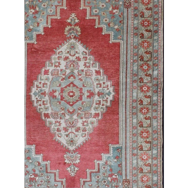 Mid 20th Century Vintage Turkish Oushak Rug With Medallion Design in Coral Pink and Light Blue For Sale - Image 4 of 11