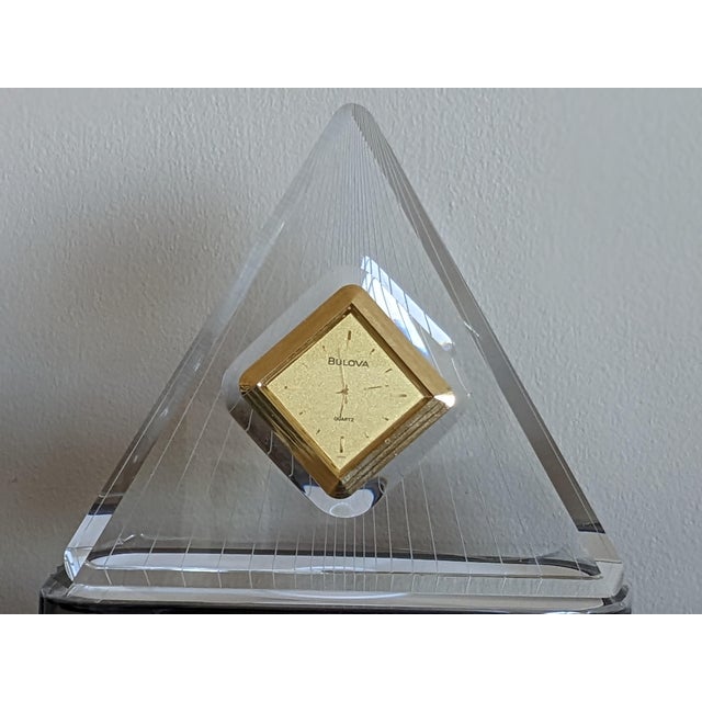 Beautiful vintage crystal clock that adds sophistication to any room. It works with battery. The crystal shines when the...