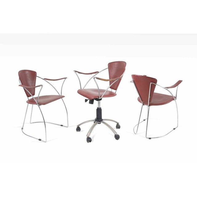 Set of 6 vintage Arrben chairs realized in Italy in 1980s. Chromed metal and leather. All the chairs have their armrests....