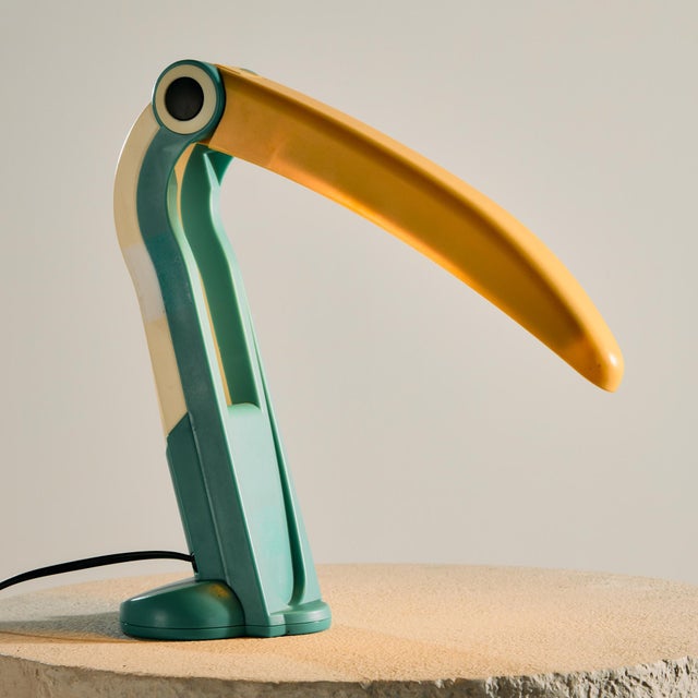 The ‘Toucan’ desk lamp designed by Huo-Tu Huang for Huangslite in the 1980s. with its playful colors and shapes, the lamp...