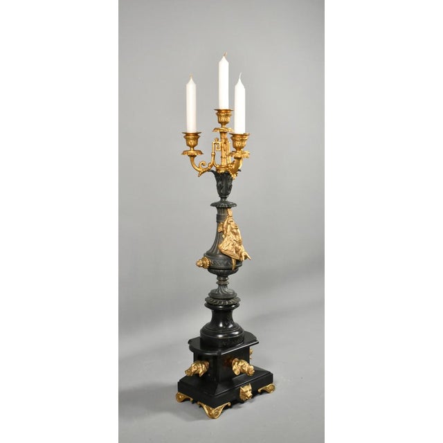 Decorative Gilt and Slate Candelabra Napoleon III This unusual candelabra is emblematic of hunting with its display of...