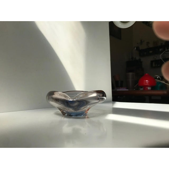 Heavy and thick decorative small bowl or ashtray composed of 3-colored glass: salmon, light blue and clear. Designed by...