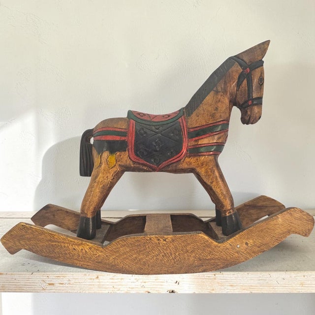 Sculptural and expressive, this vintage Mexican folk art rocking horse brings the warmth of hand-carved wood and time-...