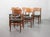 High quality solid teak wooden dining chairs with black leatherette seating. This sturdy set of 6 was manufactured in...