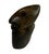 A striking vintage hand-carved stone sculpture featuring an abstract stylized human figure. The compact sculpture is...
