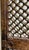 A rare matched pair of antique architectural window shutters featuring hand-forged iron jali latticework set within...
