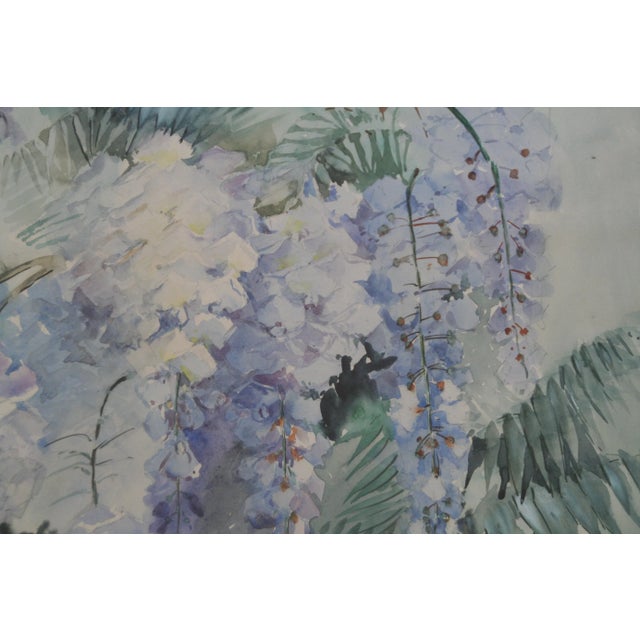 Beautiful watercolor of wisteria vine and blossoms. Signed "B. Kepsian" lower right. Displayed in a painted off-white wood...