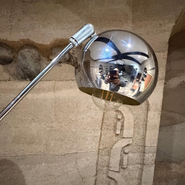 For your consideration, a vintage Robert Sonneman Triennale "Atomic Orbiter" floor lamp from the 1960s or 1970s.The lamp...