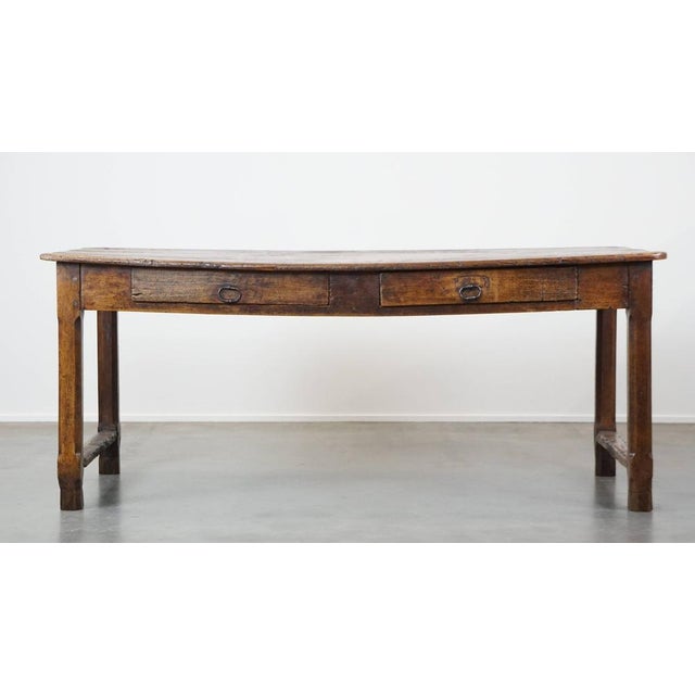 This great antique French dining table with an amazing top from the late 18th century. This very beautiful French antique...