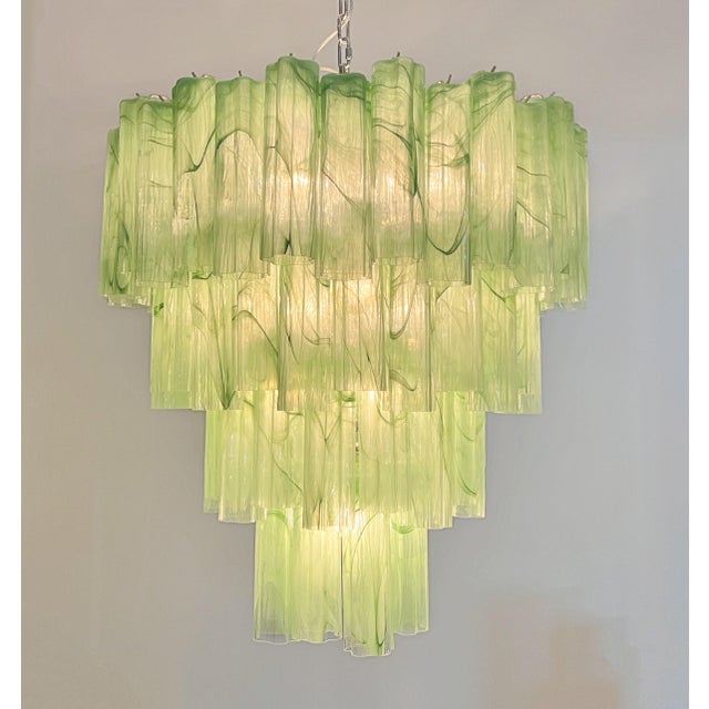 DUTIES FREE A striking statement piece, this monumental Italian chandelier embodies the timeless artistry of Murano...