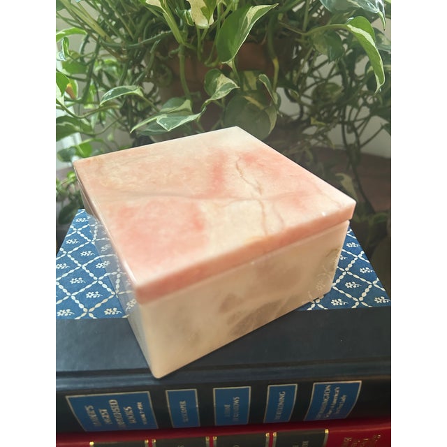 This vintage Italian box was hand carved from genuine Volterra alabaster, featuring a clever swivel-top design and...