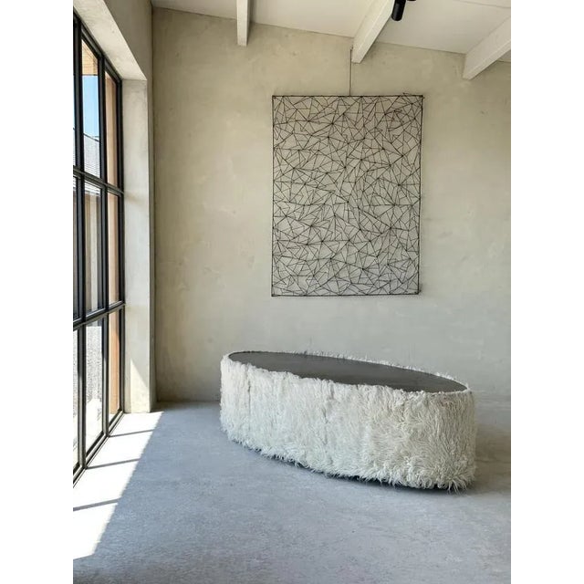 A Kitsch Italian Brass and faux fur covered Coffee Table, circa 1970-80. Possibly a special commission for a shop or...