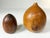 Offered are a pair of turned wood weed pots. The larger of the two is signed, "JDR". It has been turned from five distinct...