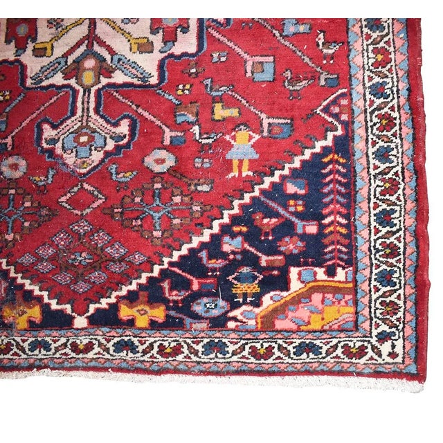 Vintage rug scouted from a pre estate sale in Oklahoma City. This rug features gorgeous pinks, blues, reds and yellows. It...