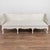 19th century Swedish Gustavian deep seated bench with back, crafted in pine. The bench features simple curved arms and...