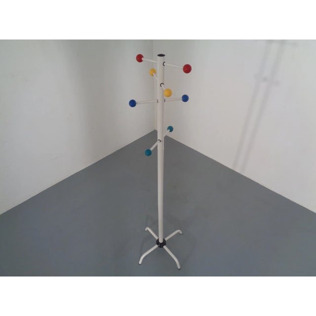 A detachable, Italian dressing made of metal and plastic from the 1970s.