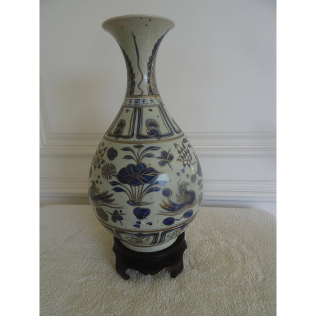 A beautiful blue & white vase with some calligraphy on the neck of the vase. Early 20th century fabulous gilt highlights...