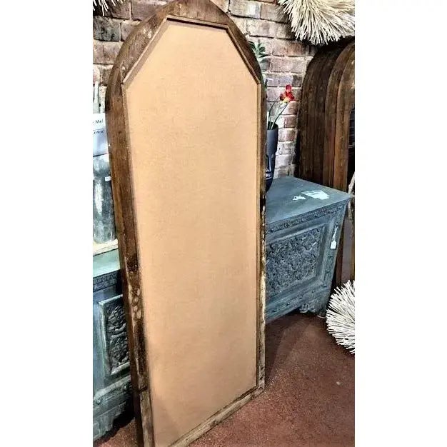 Beautiful solid wood accent mirror, 5 detailed sections that are symmetrically fanned out within an arch. A wonderful...