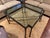 Custom Glass & Iron Coffee Table. Excellent condition. Solid base. Bevel edge glass top. See photo for details in metalwork.