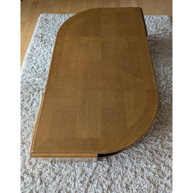 An exceptional statement piece, this coffee table by Universal Furniture LTD is a masterclass in late 20th-century...