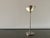 These sculptural angel wing candlesticks are attributed to Italian designers. Diameter of the candlestick base approx. 8.5...