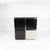Highboard composed of 4 modules: 2 with black lacquered ash doors, 1 with a steel door, and 1 with a bar cart with a black...