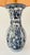 A 20th century table lamp made from a baluster shaped Delfia vase. The white lamp is decorated with lush flowers, leaves...