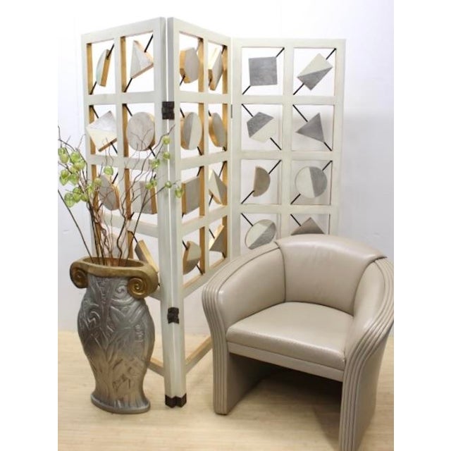 Mid-century modern three panel geometric room divider. Basic geometric shapes on iron rods. Minor wear. 3 solid wood...